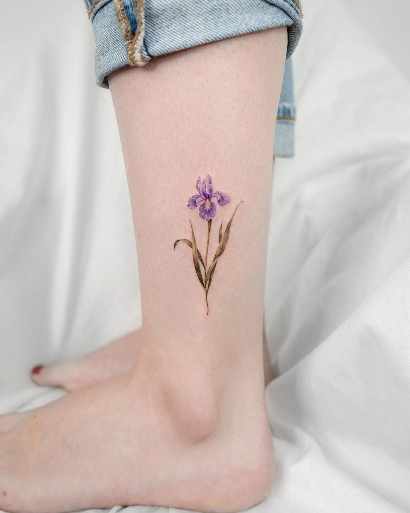 10 Best Iris Tattoo Designs And Meanings Howlifestyles Iris Tattoo Tattoo Designs And