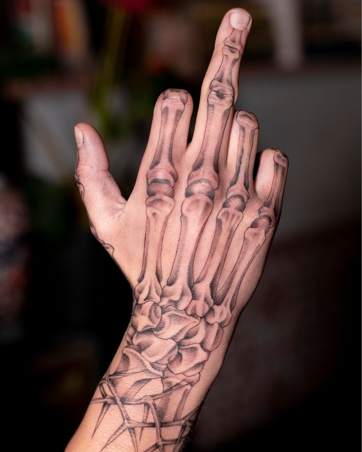 10 Stunning Skeleton Hand Tattoos You Ll Love 3 Skeleton Hand Tattoo