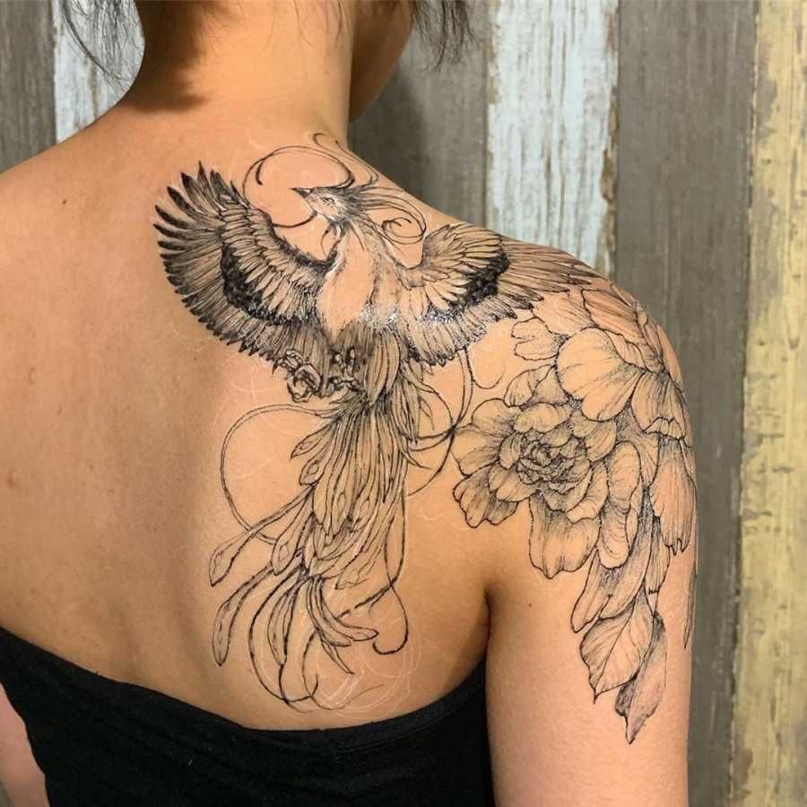 20 Phoenix Tattoos That Show Off A Woman Amp 39 S Inner Fire Phoenix Tattoo Design Phoenix Bird