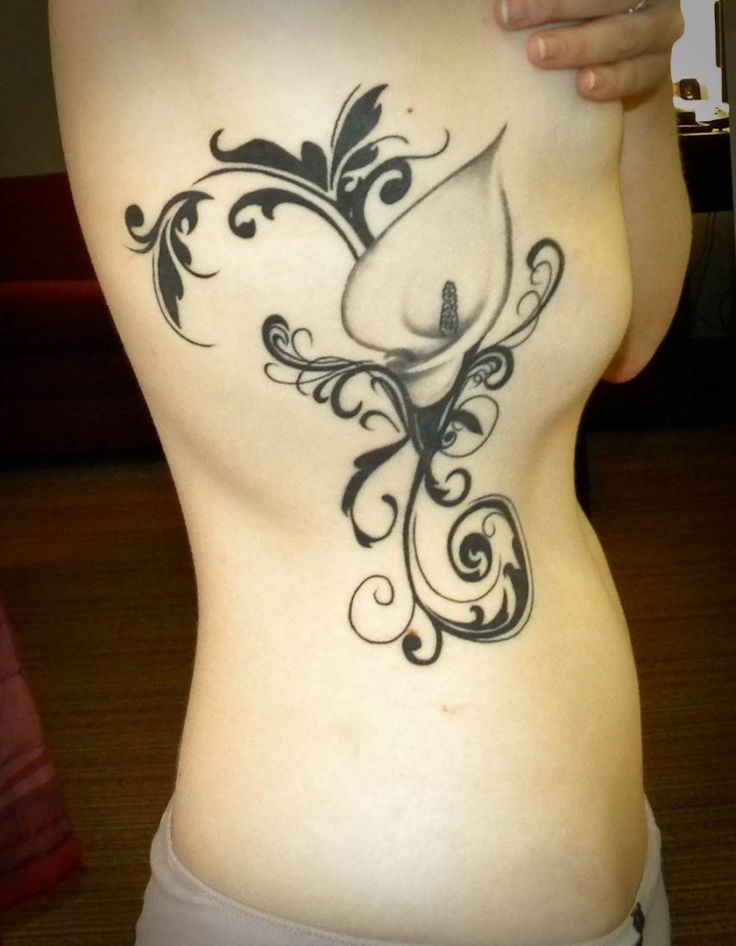 25 Attractive Rib Tattoo Designs