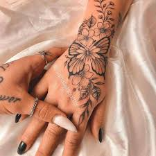 25 Coolest Hand Tattoos For Women And Men Familyminded