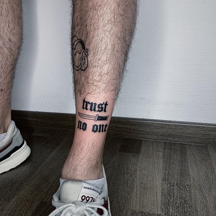 25 Trust No One Tattoo Designs You Need To See