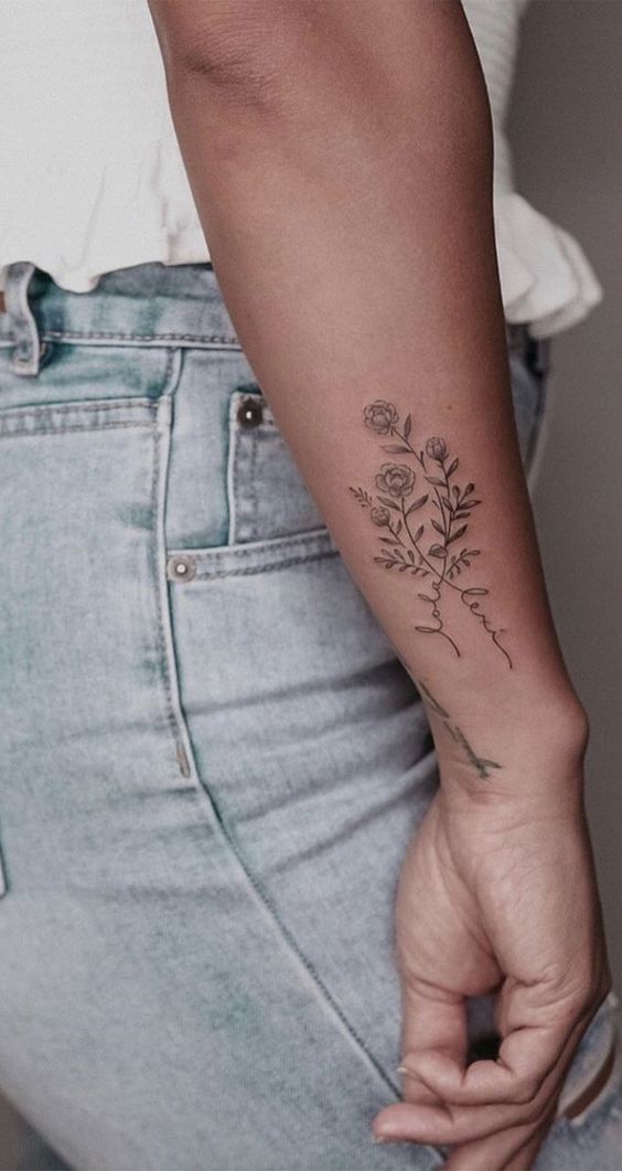 30 Beautiful Flower Tattoo Ideas Flower Tattoo Above Wrist Writing Tattoos Inspirational