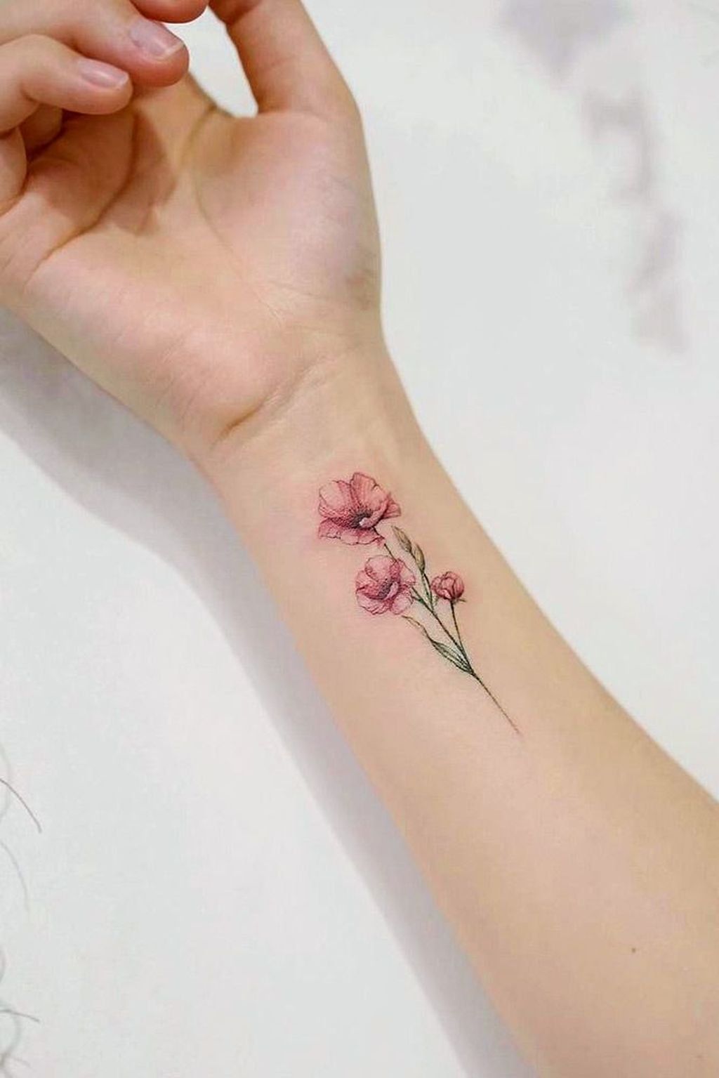 30 Beautiful Flower Tattoo Ideas Poppy Tattoo Above Wrist I Take You Wedding Readings