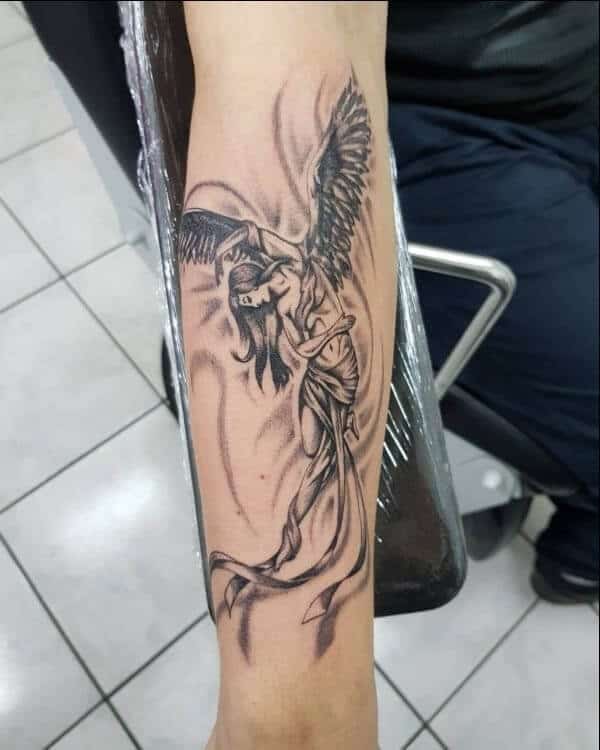 44 Beautiful Guardian Angel Tattoo Designs To Get Inked Angel Tattoo