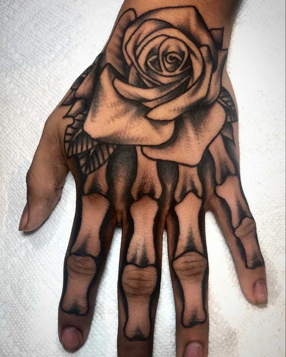 60 Skeleton Hand Tattoo Ideas And The Symbolism Behind Them Bone