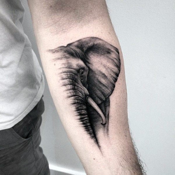 A Man With A Tattoo On His Arm Has An Elephant S Eye In The Center