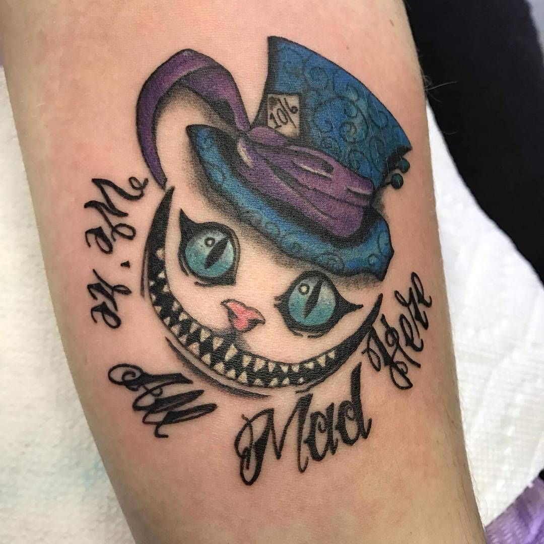 10 Enchanting Alice In Wonderland Tattoo Designs