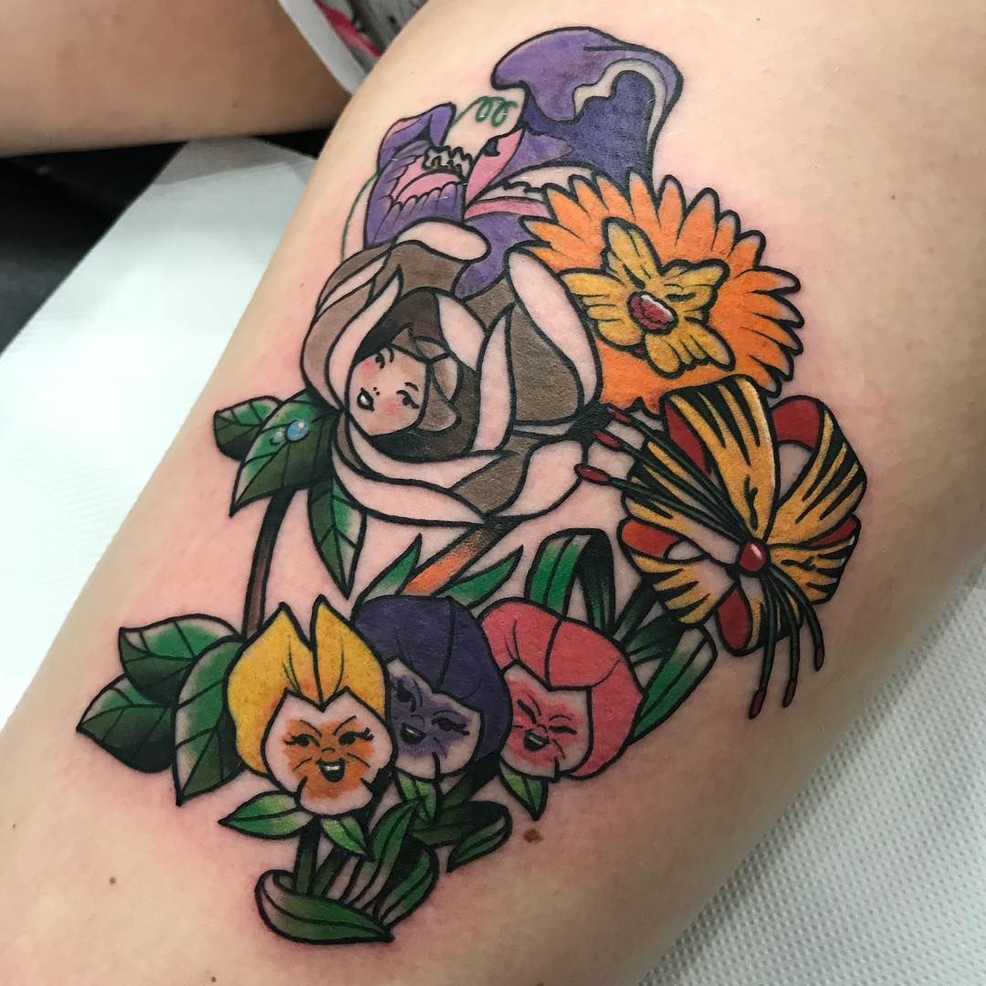 5 Enchanting Alice in Wonderland Flower Tattoo Ideas