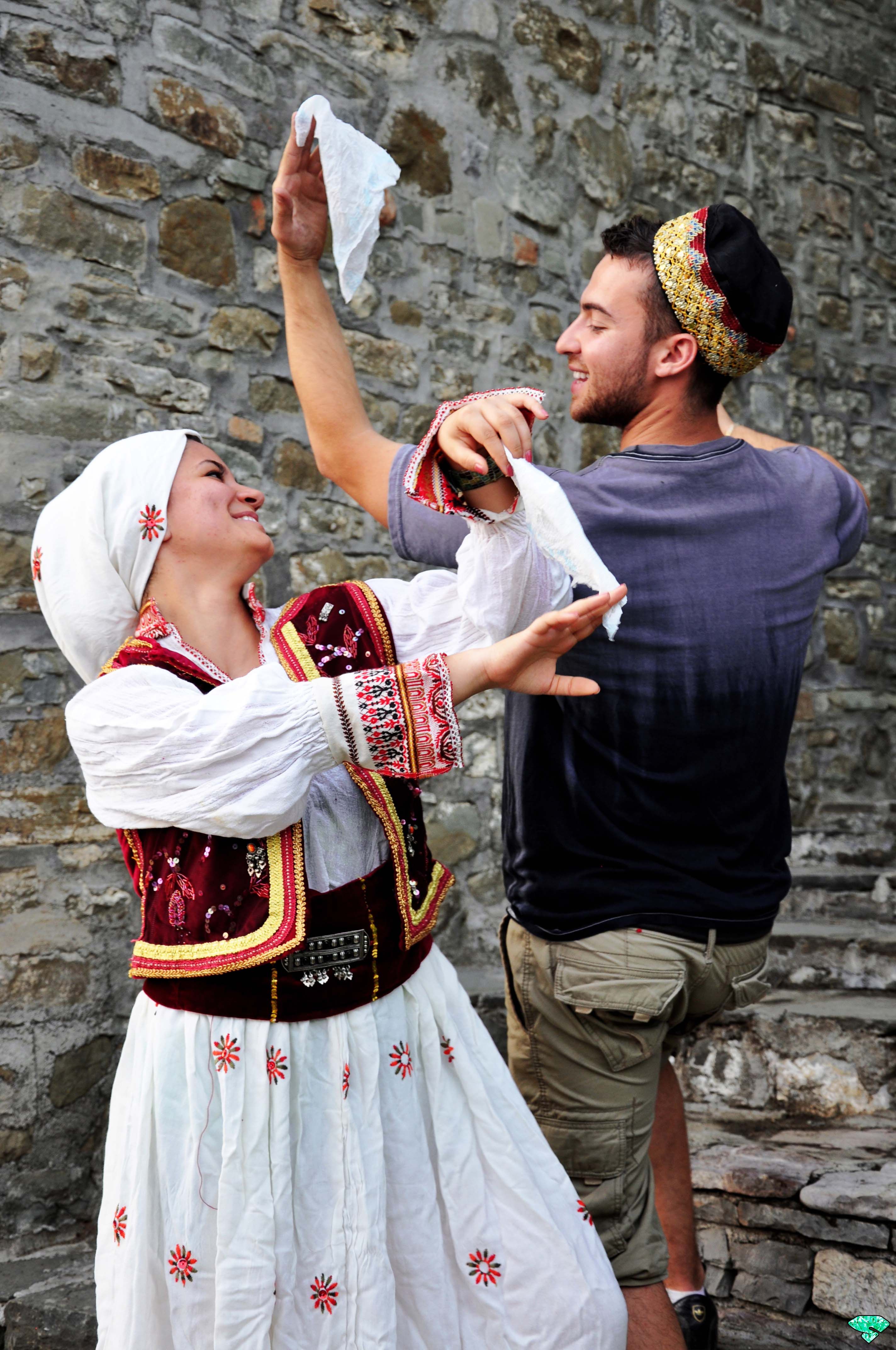 An Albanian Dancer In Traditional Costume Waits For The Start Of A