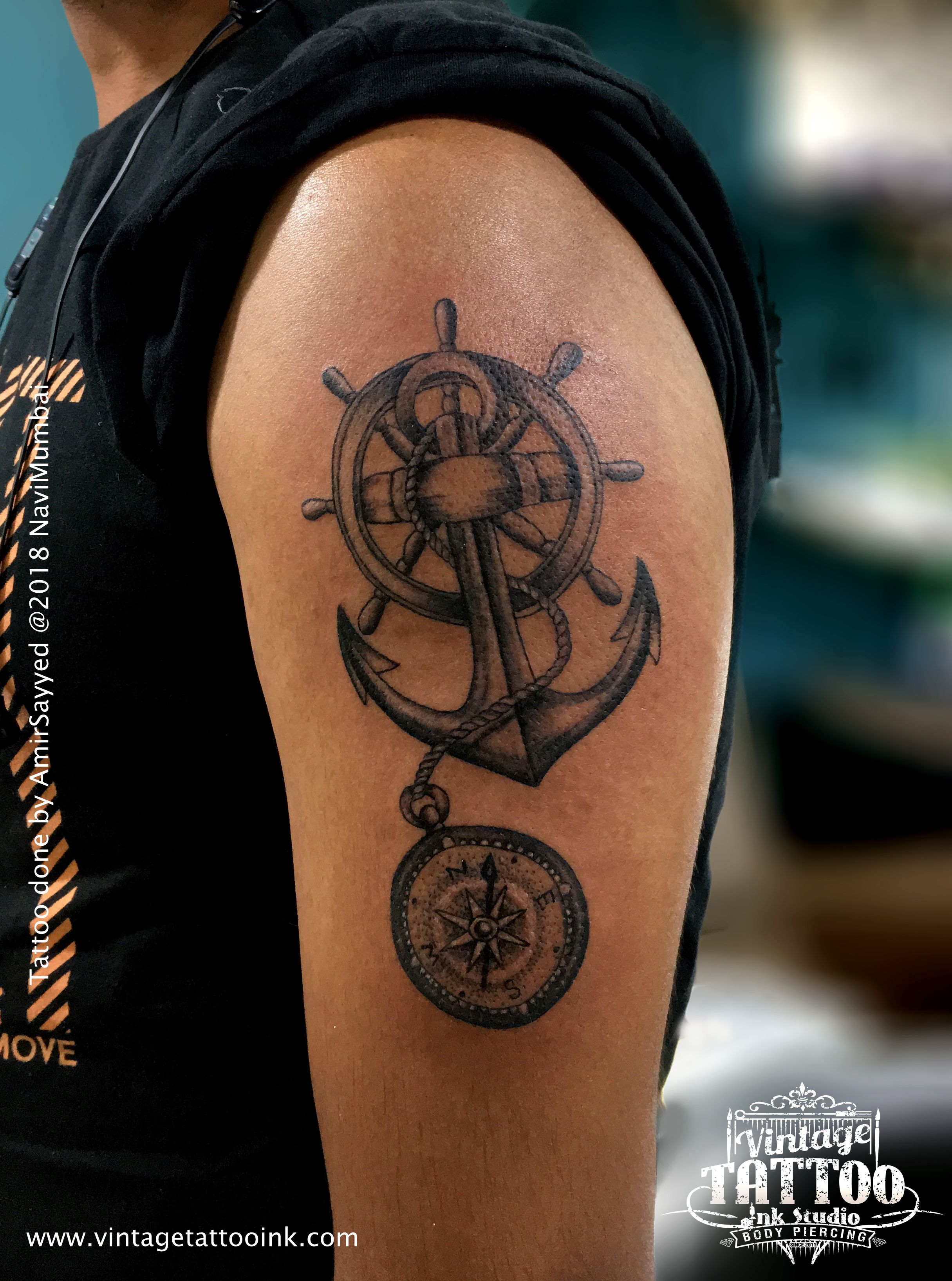 An Anchor And Compass Tattoo Represents The Guiding And Grounding