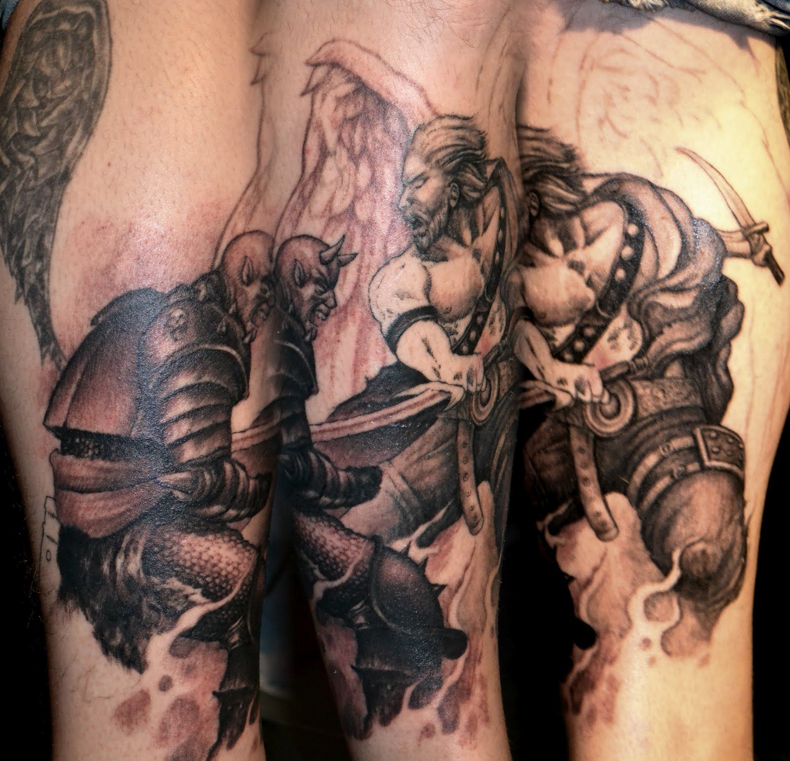 Angel And Demon Fighting Tattoo