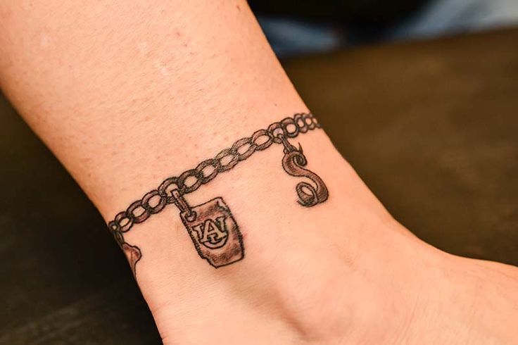 Ankle Charm Bracelet Tattoo Ideas for Style Enthusiasts