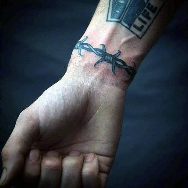 Barbed Wire Wrist Tattoo: Meaning and Design Trends