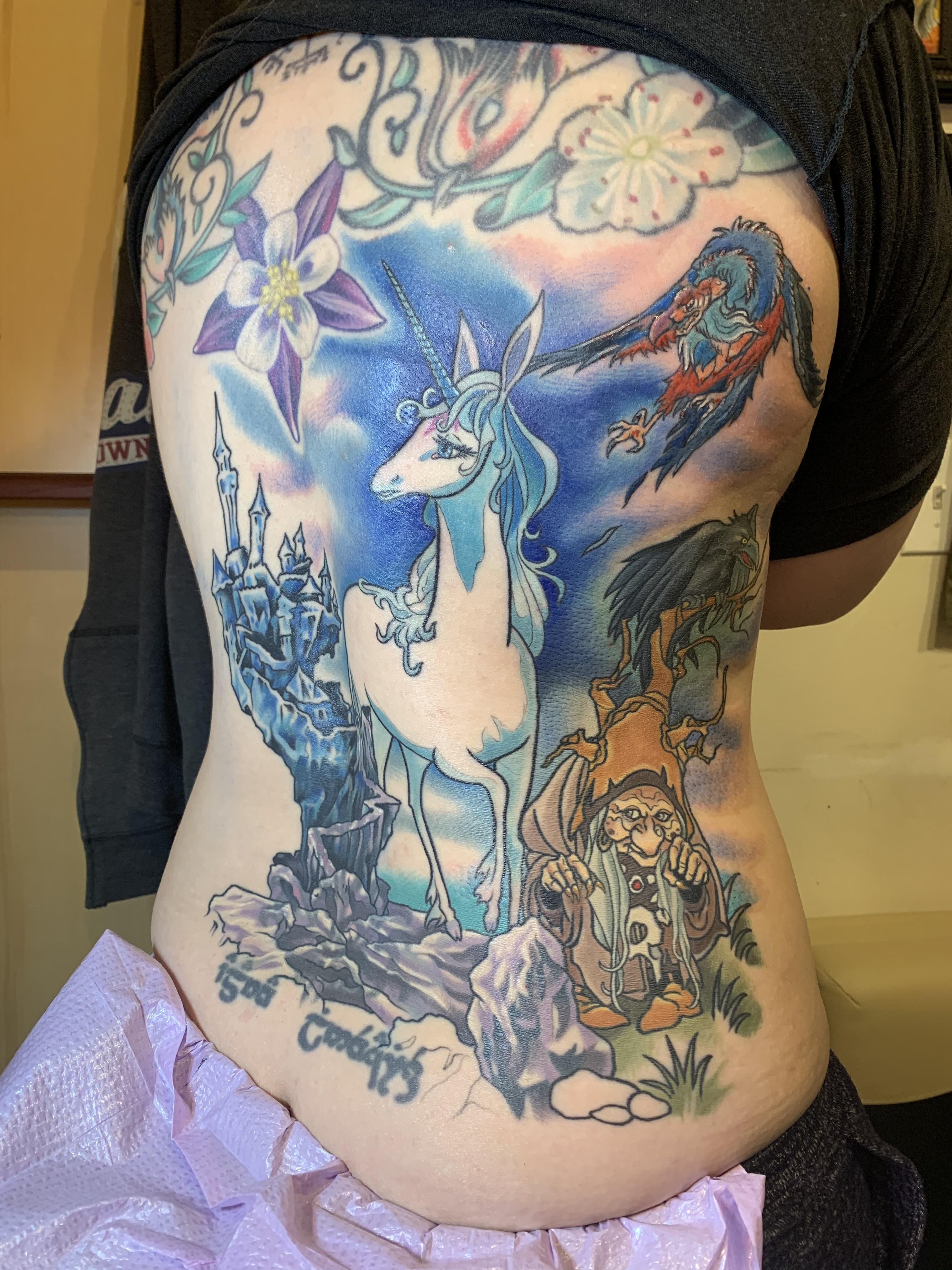 Beginnings Of A Last Unicorn Backpiece Cover Up By Mo Malone At Rising