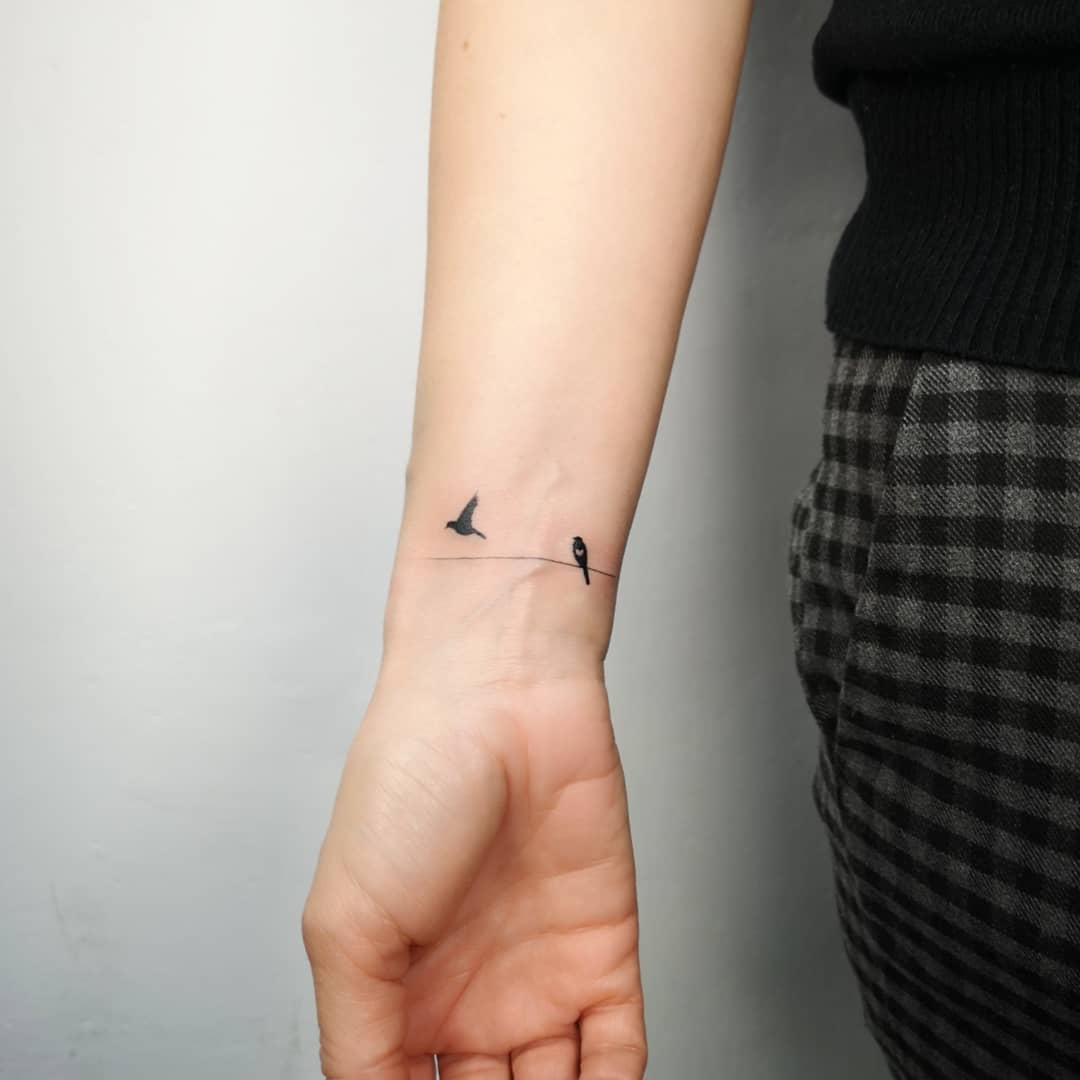 Birds On A Wire Tattoo: Ultimate Guide and Inspirations