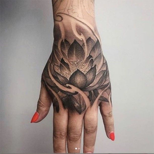 Black And Grey Lotus On Hand Hon Tattoo Hand Tattoos For Guys Hand Tattoos Hand Tattoos For