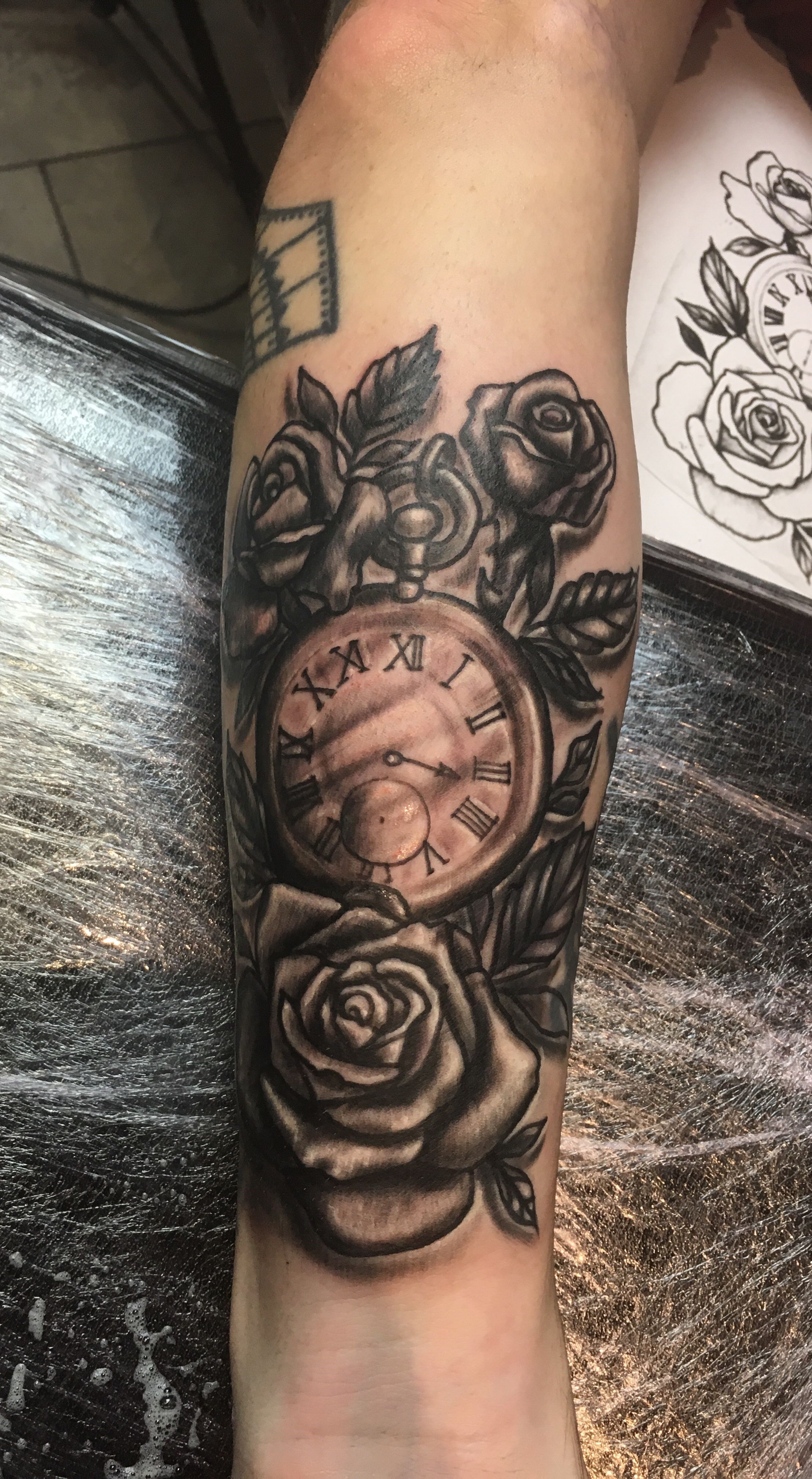 Clock and Rose Tattoo: Timeless Beauty Explored