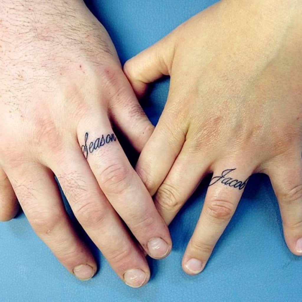 Couple Rings Tattoo On Fingers Tattoo Designs Tattoo Pictures