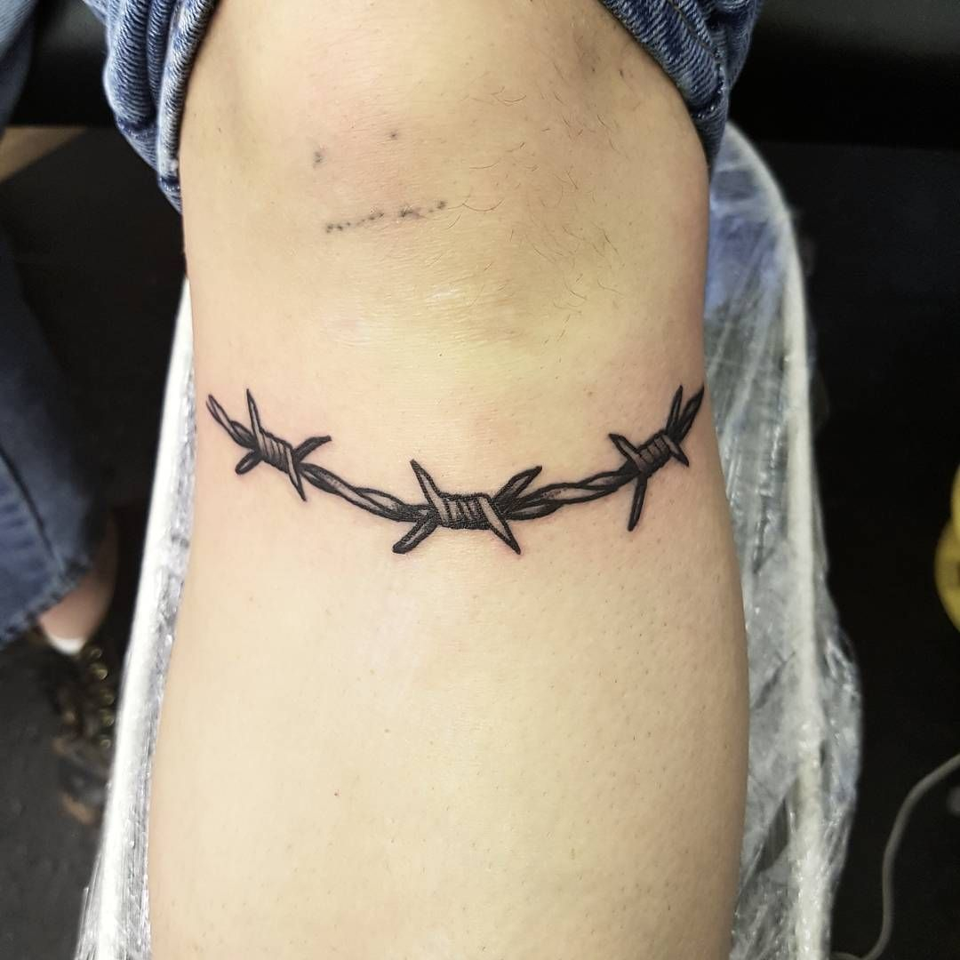 Cross Barbed Wire Tattoo Meaning and Designs