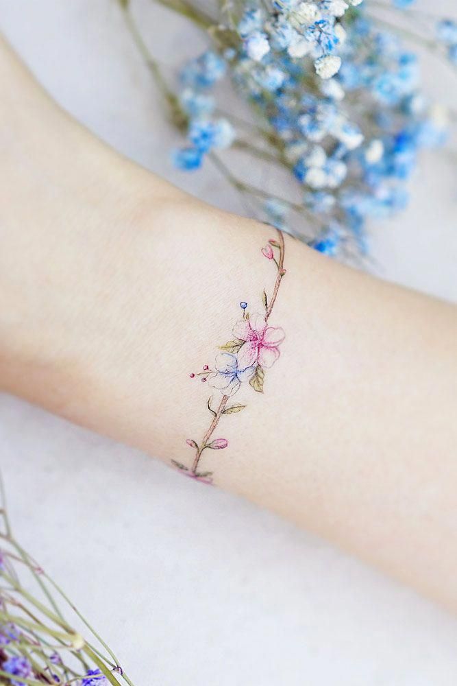 5 Delicate Flower Wrist Tattoos You'll Love