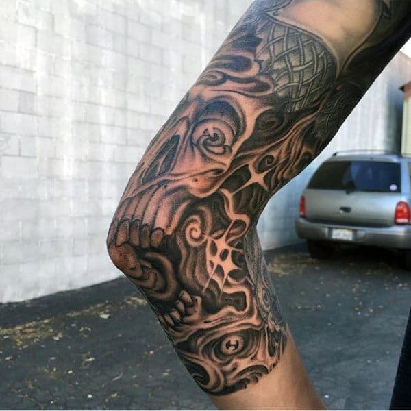 20 Sleek Elbow Tattoo Ideas for Men