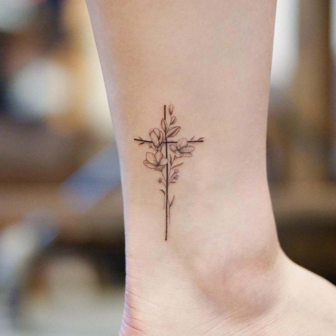 Elegant Lily Flower Cross Tattoo Idea