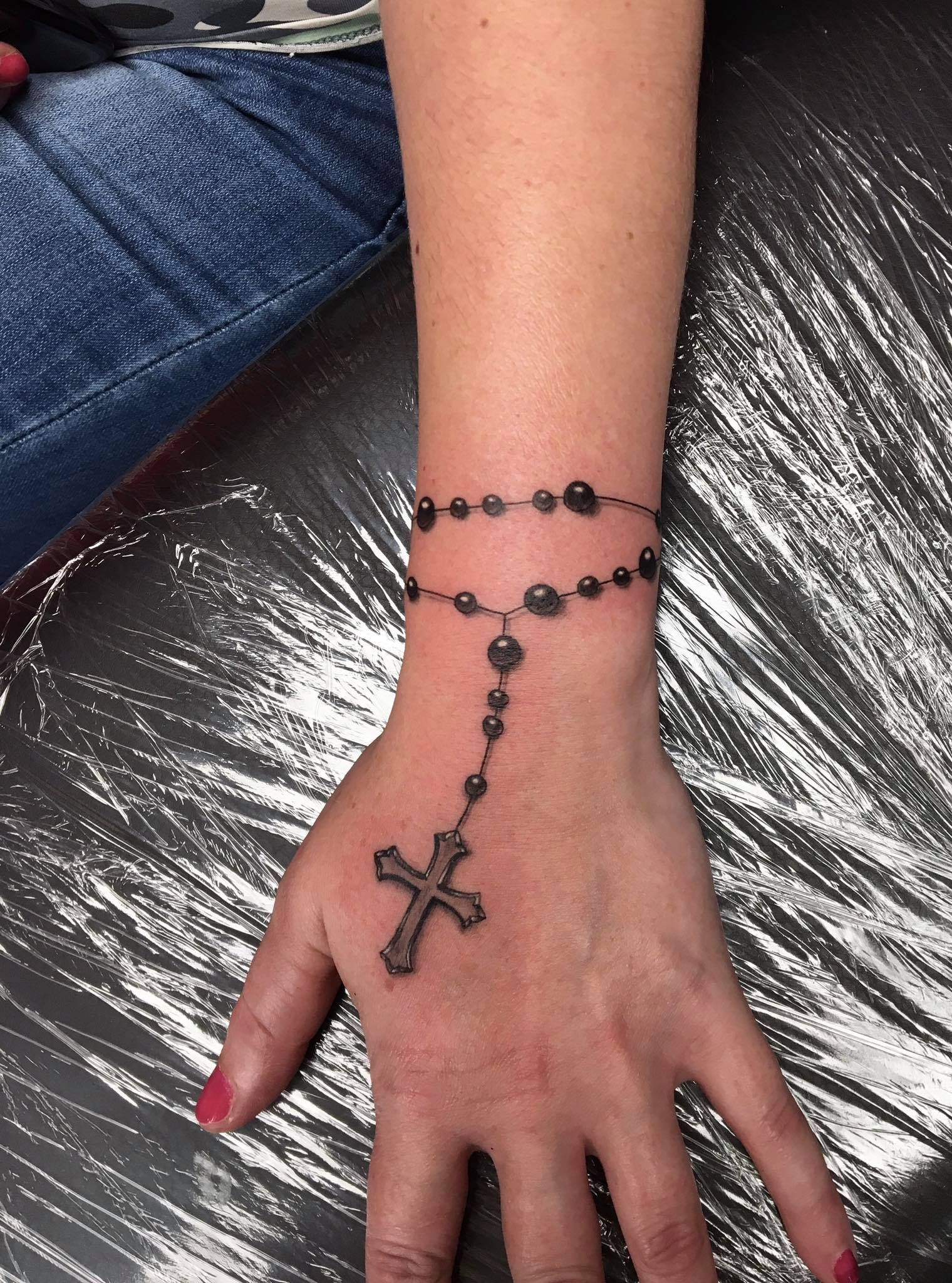 5 Stunning Female Rosary Tattoo Ideas for Hands