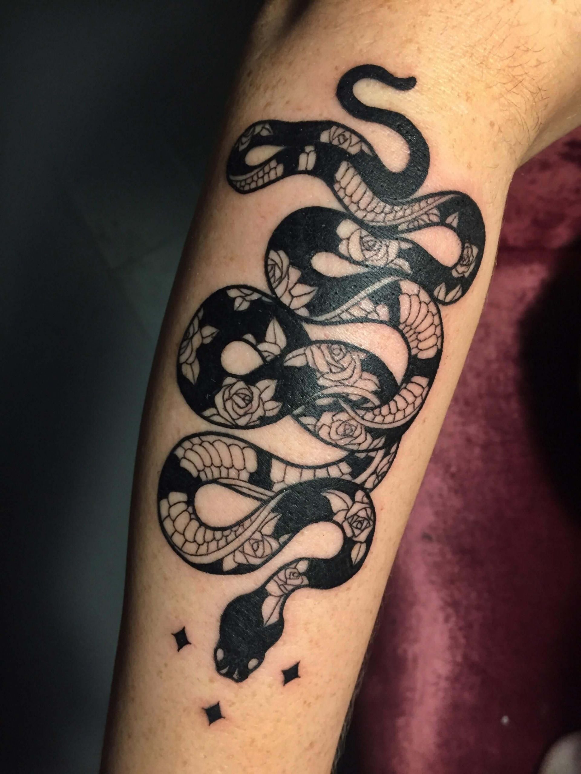 25 Elegant Feminine Snake Tattoo Ideas for Empowerment