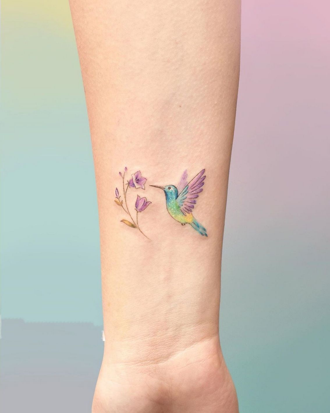 Fine Line Hummingbird Tattoo: Delicate Artistry