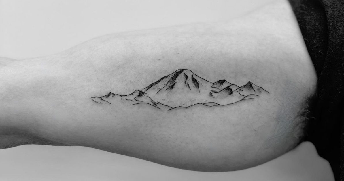 Fine Line Mountain Tattoo On The Inner Arm