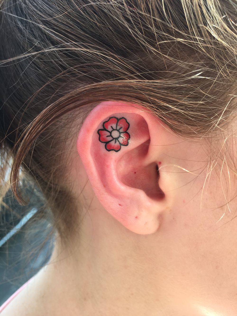 Flower Tattoo on Ear: Designs and Ideas for 2023