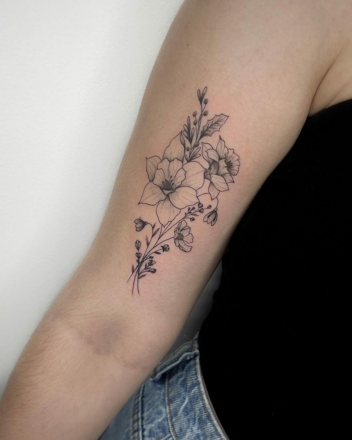 Four Different Tattoos With Flowers On Them And The Words December Birth Flower Tattoo Ideas