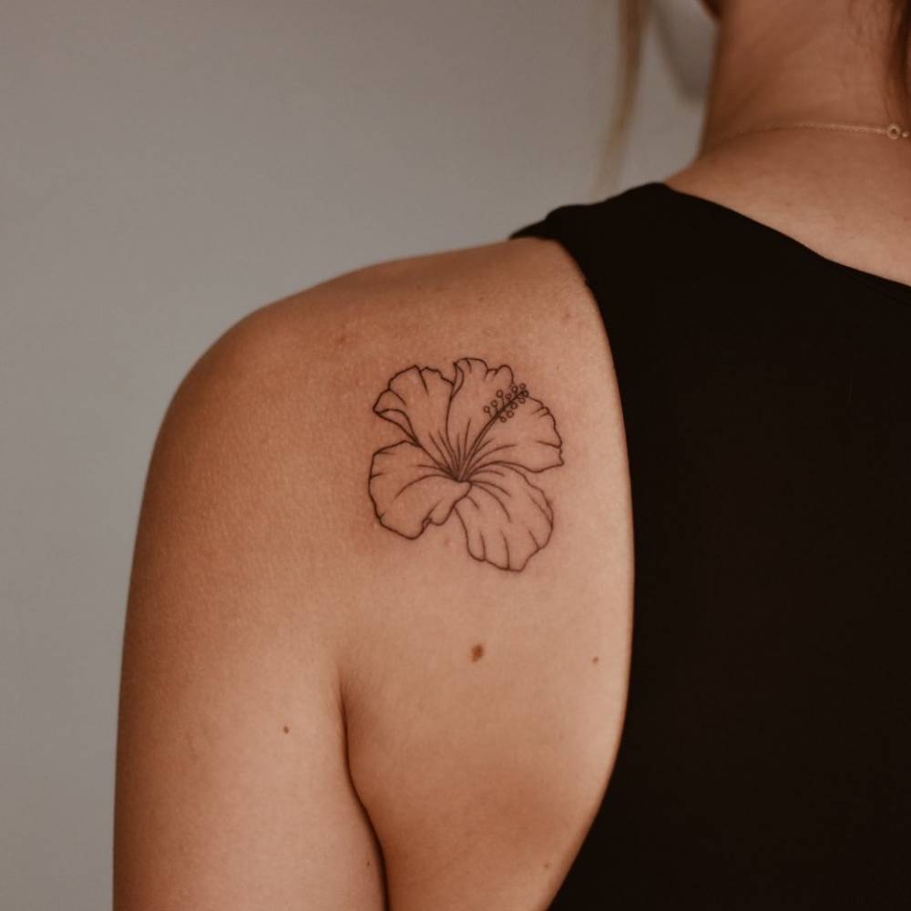 Hibiscus Flower Tattooed On The Shoulder Blade