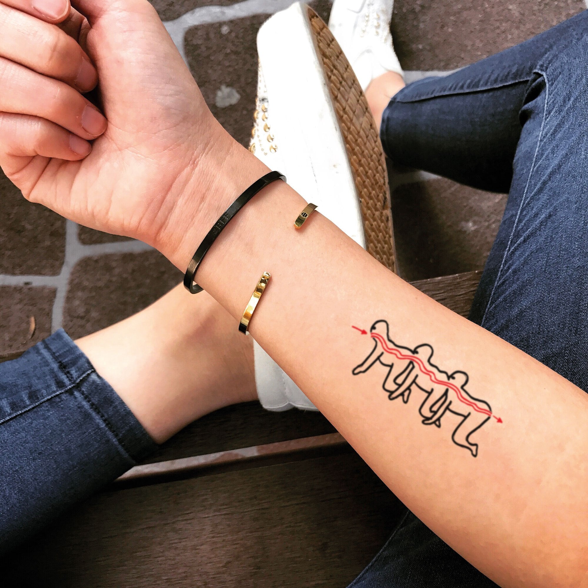 Girl's Shocking Human Centipede Tattoo Revealed