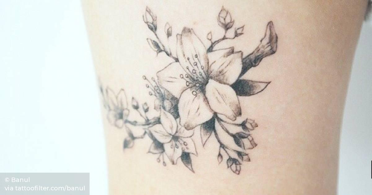 Illustrative Cherry Blossom Tattoo On The Right Thigh