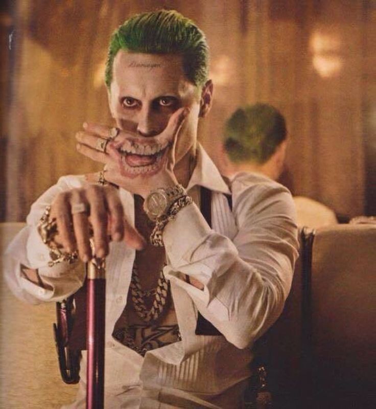 7 Creative Ideas for Your Joker Mouth Hand Tattoo