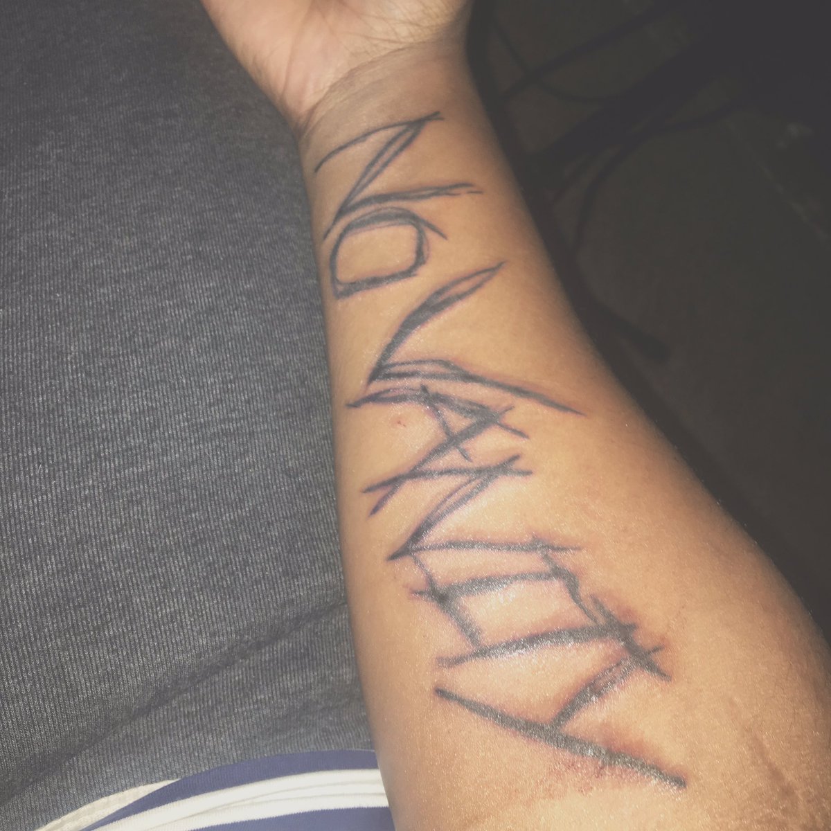 7 Meanings Behind Juice Wrld's No Vanity Tattoo