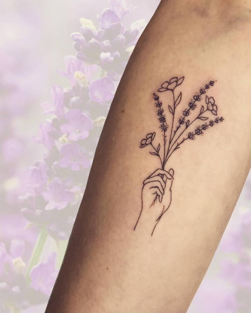 Line Art Hand Holding Flowers Tattoo On The Inner