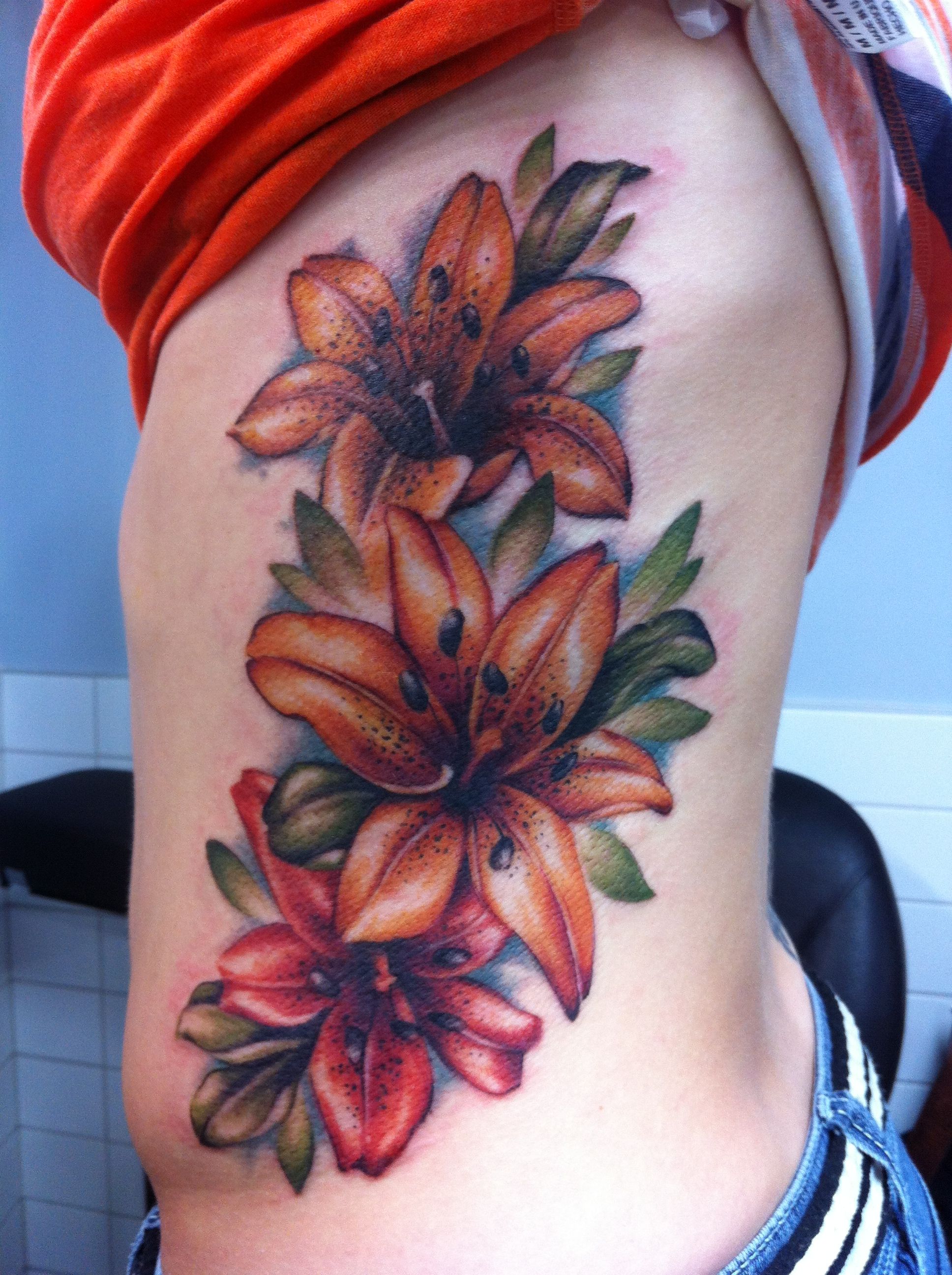 5 Symbolic Meanings Behind Tiger Lily Tattoos