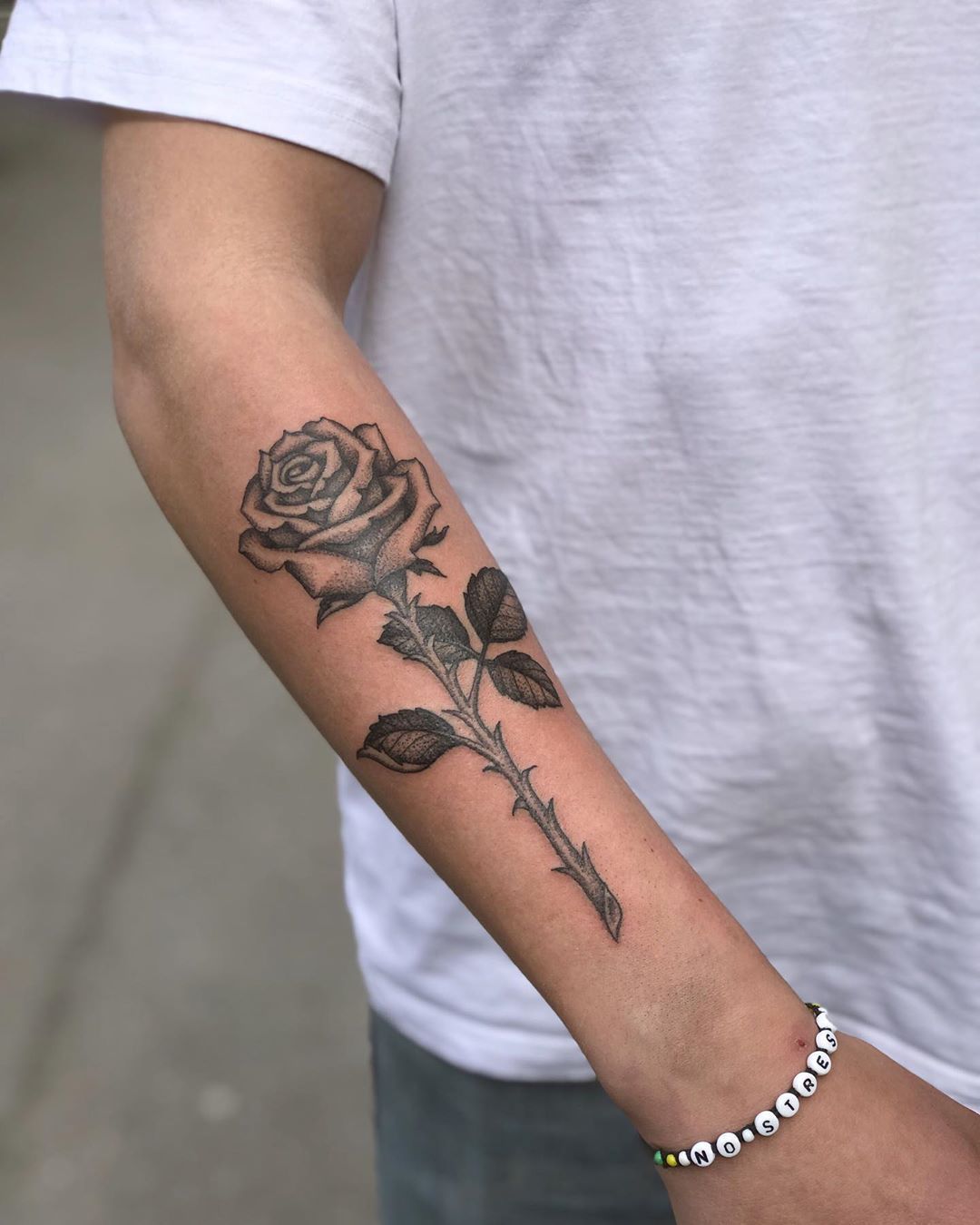 Stunning Rose Tattoo Designs for Men's Forearms