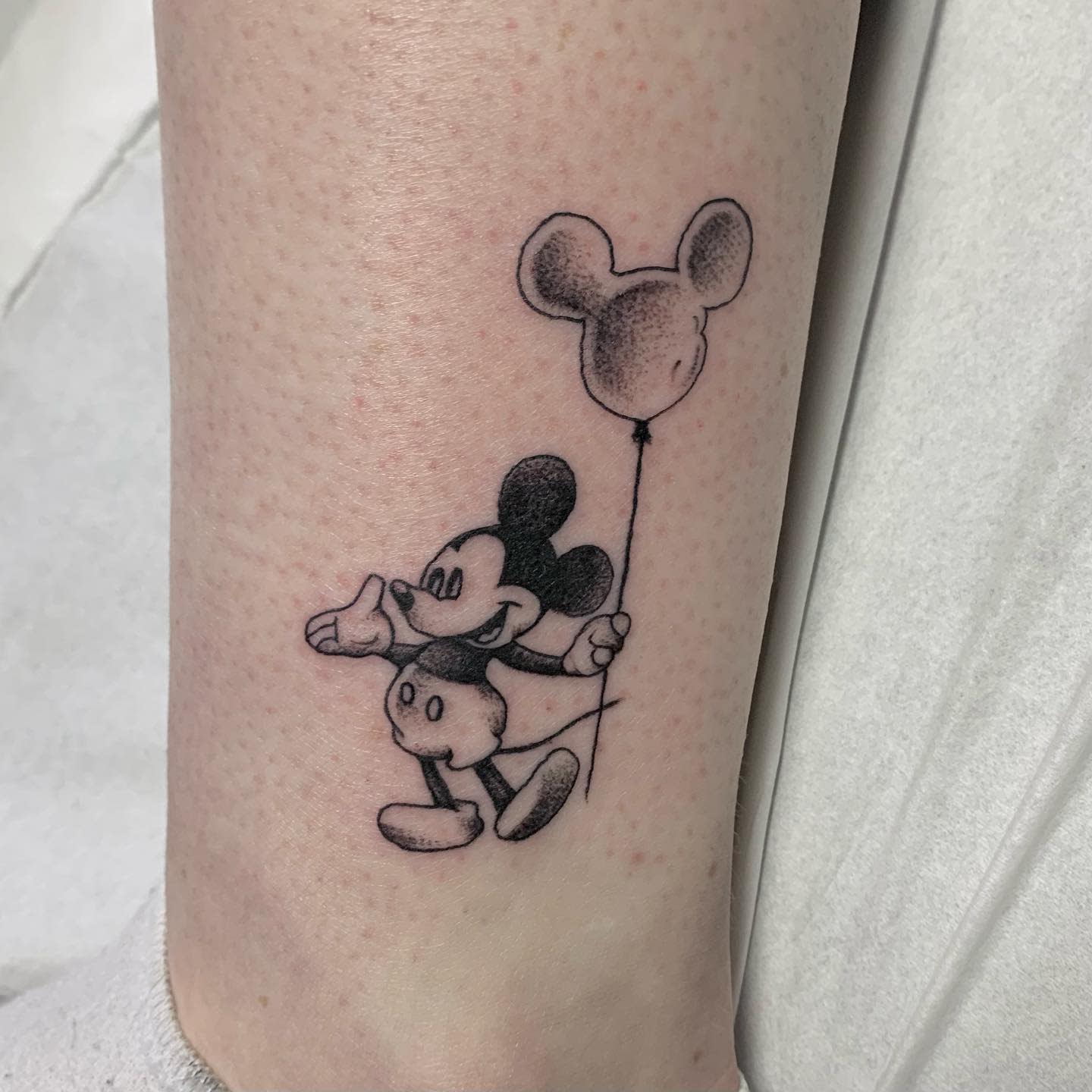 Mickey Mouse Tattoo Located On The Ankle