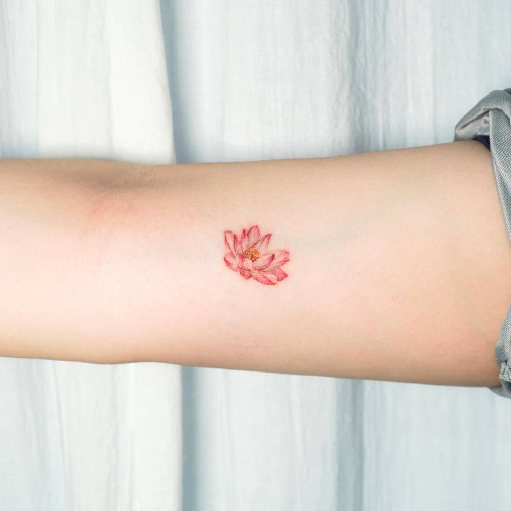 Micro Realistic Style Lotus Flower Tattoo Located On