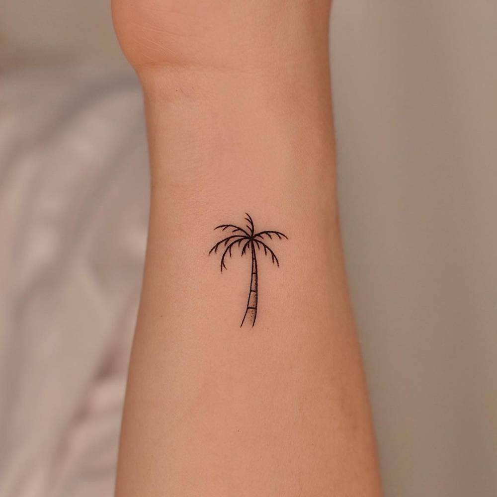 Minimalist Palm Tree Tattoo On The Left Inner Wrist