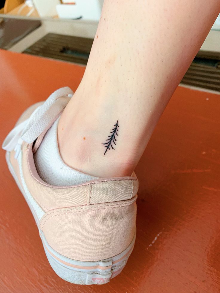 Minimalist Pine Tree Tattoo: Simple Designs That Speak Volumes