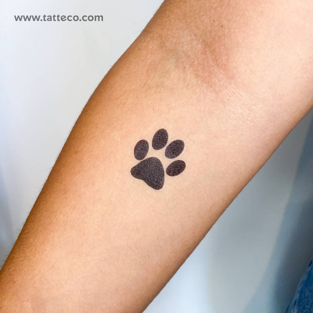 Minimalistic Dog Paw Print Temporary Tattoo Placed On