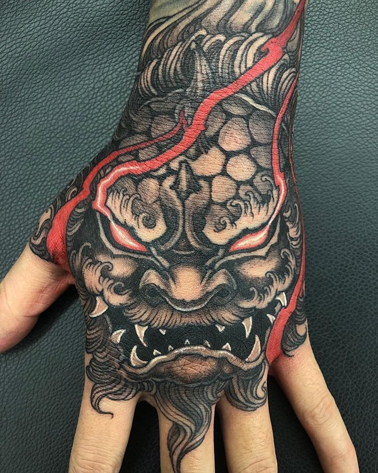 5 Stunning Oni Mask Hand Tattoo Designs