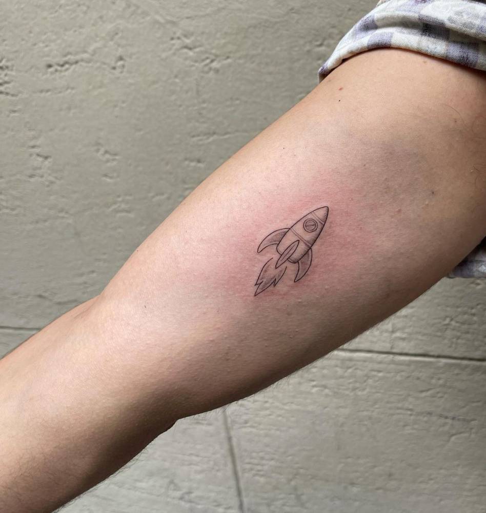 Rocket Tattoo Located On The Inner Arm