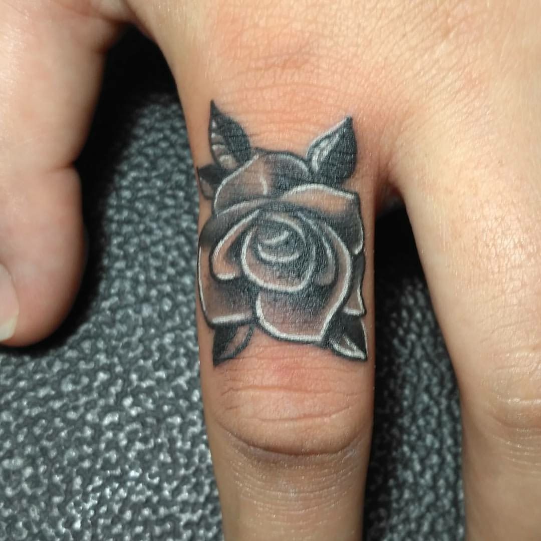 Rose Cover Up On Ring Finger Ringfingertattoo Fingertattoo Tattoos Ring Finger Tattoos