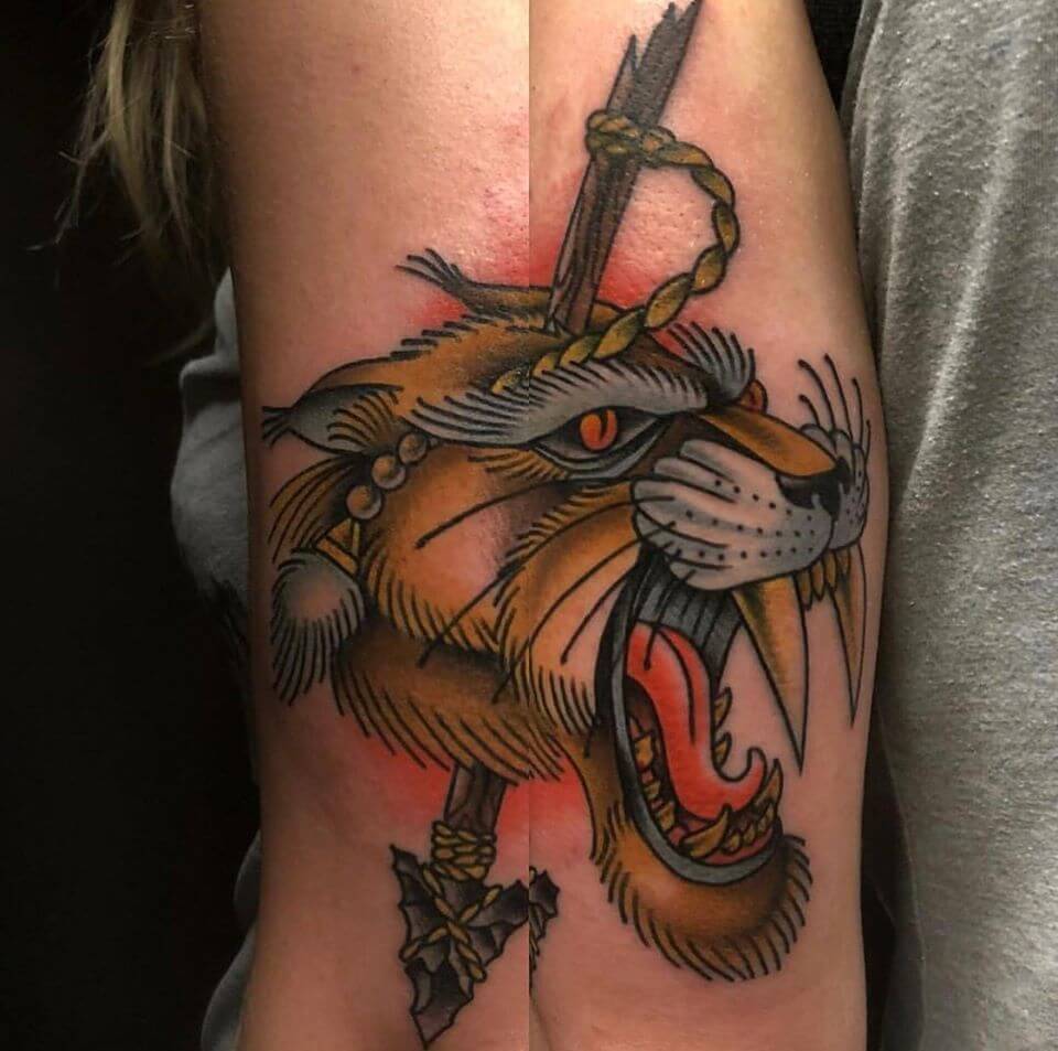 5 Stunning Saber Tooth Tiger Tattoo Ideas